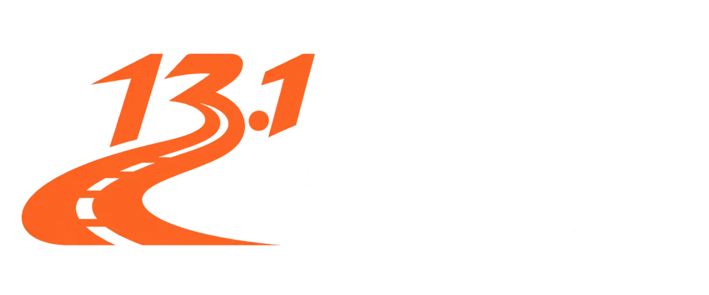 Hometown Half 13.1 road logo color reversed with signal orange and white text